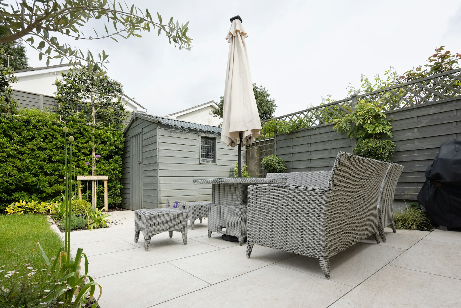 Stone patio with planting beds